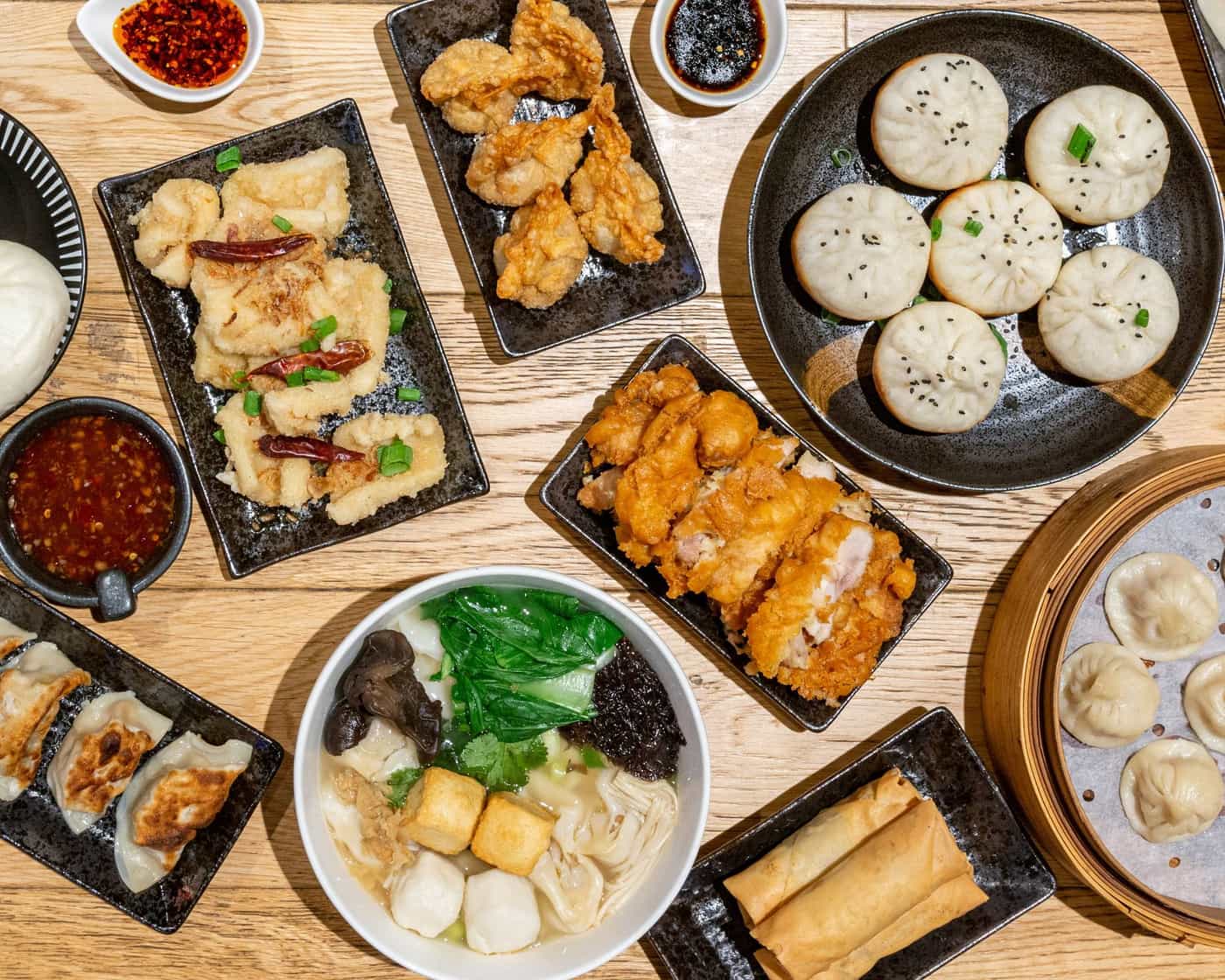 A table spread of WONTONTON dishes